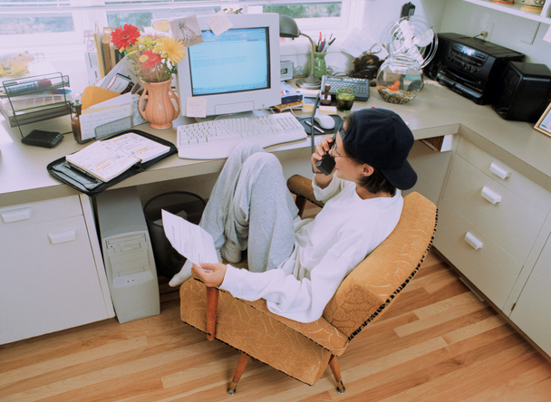 Casual Businesswoman Working at Her Home Office